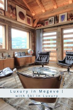 a living room filled with furniture and windows covered in wooden slatted shutters