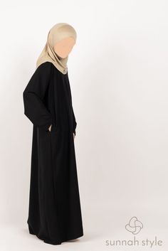 Girls Plain Closed Abaya (Black) - Sunnah Style Modest Black Khimar, Black Abaya With Modesty Panel For Eid, Black Long Modest Abaya, Modest Black Thobe For Eid, Long Abaya With Modesty Panel, Black Long Abaya With Modesty Panel, Long Black Modest Khimar, Black Long Modest Niqab, Long Black Modest Niqab