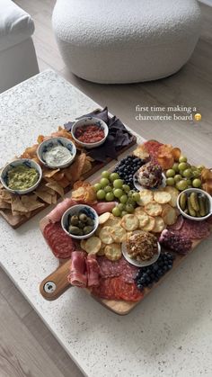 two trays filled with different types of food on top of a table next to each other