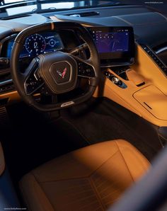 the interior of a car with dashboard and steering wheel