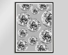 a black and white poster with disco balls on it