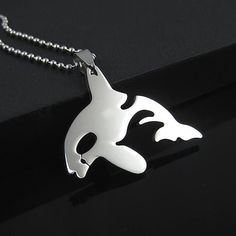 One(1) piece of Stainless Steel Orca Killer Whale Pendant with one(1) Free 23-inch-long Chain Necklace! Unique & Collectible!  It will turn heads! Second to none!  This may be the only Stainless Steel Orca Killer Whale Pendant available in etsy! Great gift for Orca Lovers or Watchers! Size of Pendant: approx.  1.1 inch(H) x 1.1 inch(W) x 0.08 inch(Thick) Length of Chain Necklace: approx. 23 inches long This pendant is made of Durable Stainless Steel! Important Note: 1/ This item is for adults but not for kids because its edge may be sharp and harmful to kids. 2/ 100% Customer Satisfaction Guaranteed.  In case that you have any issues with the item or delivery, please kindly communicate with me first via etsy before you leave any feedback.  I am always here to serve you well, please kindly Ocean Mammals, Whale Pendant, Killer Whale, Art Pendant, Unique Collectibles, Long Chain Necklace, Killer Whales, Necklace Unique, Stainless Steel Pendant