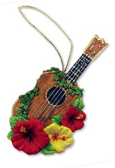 a ukulele ornament decorated with flowers and leaves