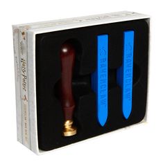 two blue handles in a black box