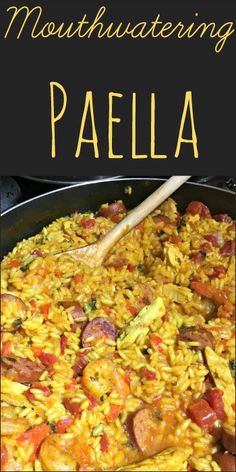 a pan filled with pasta and sausages next to a wooden spoon on top of it