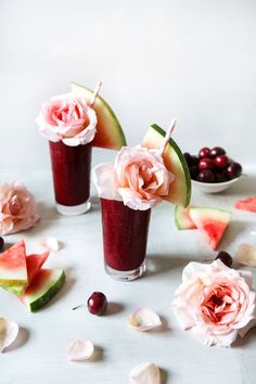 watermelon and cranberry smoothie with cherries on the rims