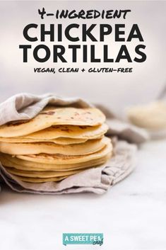 a stack of tortillas sitting on top of a table