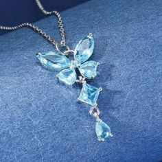 Elevate Your Fashion Statement And Add A Touch Of Elegance To Your Outfit With This Stunning Butterfly Pendant Necklace From Shein. The Necklace Features A Beautiful Butterfly-Shaped Pendant Adorned With Blue Cubic Zirconia Stones That Sparkle Under Any Light. Made Of High-Quality Stainless Steel, The Necklace Is Sturdy And Durable, Ensuring It Will Last A Long Time. With A Necklace Length Of Approximately 8 Inches Plus A 2-Inch Extender, It Is Perfect For Any Occasion, From A Casual Day Out To Elegant Blue Crystal Necklace With Clavicle Chain, Blue Crystal Pendant Necklace With Clavicle Chain, Blue Crystal Necklaces For Gifts, Blue Crystal Necklace Gift, Blue Crystal Necklaces As A Gift, Blue Crystal Necklace As Gift, Elegant Blue Pendant Crystal Necklaces, Elegant Blue Sterling Silver Crystal Necklaces, Elegant Blue Pendant Crystal Necklace