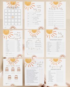 the wedding stationery is set up with gold and white sunbursts on it