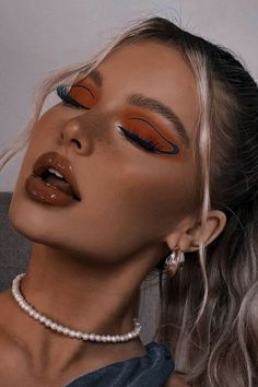 Orange Graphic Liner Makeup, Orange And Navy Makeup, Orange Eyeliner Makeup Looks, Blue And Orange Makeup Look, Orange And Blue Makeup Looks, Blue And Orange Eyeshadow Looks, Eye Makeup Edgy, Orange Aesthetic Makeup