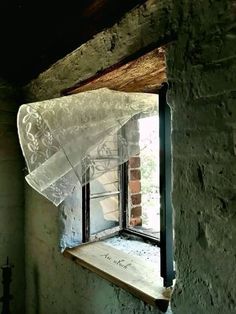 an open window in the side of a building