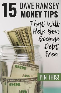 a jar filled with money sitting on top of a table