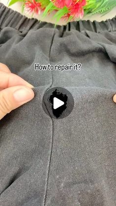 someone is removing the bottom part of their sweatpants with an advertiser's hand