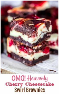 some brownies with white and red toppings are stacked on top of each other