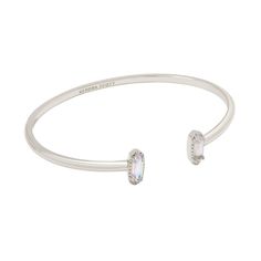 Looking for a pop of sparkle to add to your wrist stack? Meet the Emma Cuff Bracelet, aka your new style essential. Two elongated stones bookend this adjustable metal cuff you can fit to your wrist perfectly. On-trend and oh-so-cute, you'll style this bracelet time and time again. Designer, founder, and philanthropist Kendra Scott started her company in 2002, just three months after her first son was born. Her commitment to innovation, quality, customer service, and detail has taken her from a s Wrist Stack, College Closet, Kendra Scott Bracelet, Statement Cuff Bracelet, Wrist Stacks, Brass Cuff Bracelet, Simple Bangle, Brass Cuff, Simple Bracelets