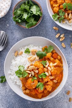 two white bowls filled with food and rice