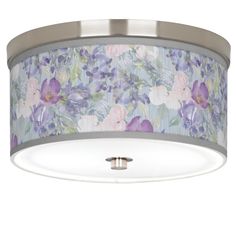 a ceiling light with purple flowers on the drum and silver trimmings, against a white background