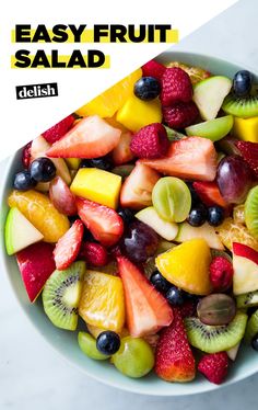 a white bowl filled with fresh fruit salad