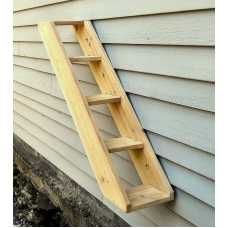 a ladder leaning against the side of a house