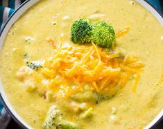 a bowl filled with broccoli cheese soup