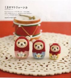 there are three small teddy bears in front of a drum on a doily with the words japan crafts