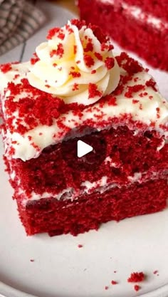 a slice of red velvet cake with white frosting