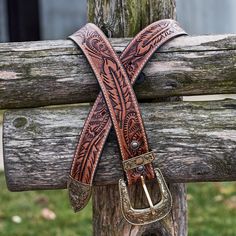 Celebrate the essence of fall year-round with the Autumn Harvest Hand Carved Leather Belt. Its deep, rich tones and exquisitely carved leaf patterns encapsulate the season's beauty, making it a standout accessory for any wardrobe. Crafted by skilled artisans, the belt features a cascade of leaves that appear to dance across the leather, each stroke and detail reflecting the care put into its creation. This is more than a belt--it's a piece of wearable art inspired by the bounty and beauty of the Leaf Patterns, Western Belt, Autumn Harvest, Western Belts, Antique Finish, Look Plus, Fall Harvest, Leather Design, Leaf Pattern