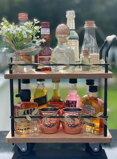 decorated mini Bar cart for a $5 target cart Liquor Auction Basket Ideas, Booze Table Ideas, Tequila Bottle Gift Ideas, Diy Liquor Gift Basket Ideas, Liquor Bottle Gift Box Ideas, Mini Bar Gift Basket, Liquor Goodie Bags, Alcohol Theme Gift Basket, Mini Bar Cart Target