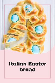 an italian easter bread with blue eggs on it and the text overlay reads,