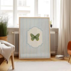 a room with a chair and a painting on the wall in front of a radiator