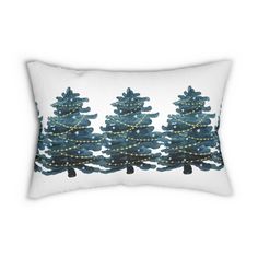 three blue christmas trees with lights on them are shown in the shape of a rectangular pillow