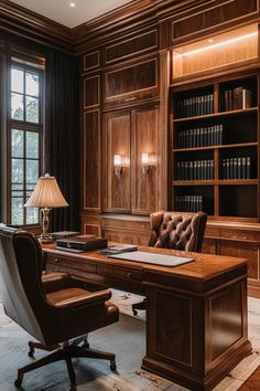 a large wooden desk sitting in front of a book shelf filled with books and a lamp