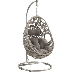 a white hanging chair with grey cushions