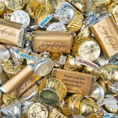 a pile of gold foil wrapped chocolates with the words free cold packaging on them