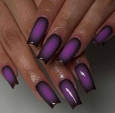 Ever feel like your nails need a royal makeover? Purple nail designs might just be the majestic touch you're craving. From thorough or in-depth plum to pastel lilac, purple nails can add a splash of sophistication and fun to any look. Trust me, once you go purple, you'll wonder why you ever settled for basic beige. Why stick to plain colors when you can have a mini masterpiece on each finger? Whet Black And Purple Nails, Black Ombre Nails, Dark Purple Nails, Purple Ombre Nails, Purple Aura, Ombre Manicure, Purple Nail Art, Velvet Nails, Purple Acrylic Nails