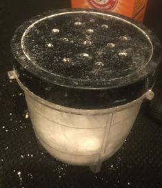 an ice bucket sitting on top of a counter