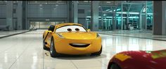 the character cars from disney pixar are in front of each other on the floor