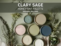 there are many different paint colors in the same pans on the wall with flowers