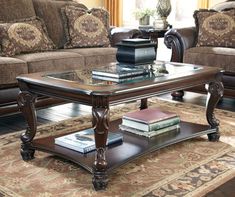 a living room table with books on it