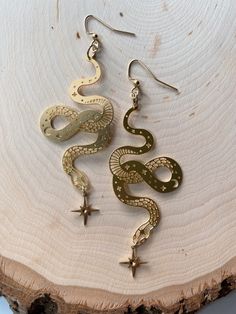 Celestial Snake Drop Earrings Witchy Earrings Gift for Her Brass Laser Cut Clip on Available Hypoallergenic Gold Plated - Etsy Magical Gold Jewelry For Festival, Magical Gold Metal Jewelry, Mystical Gold Earrings For Festival, Magical Gold Nickel-free Jewelry, Magical Gold Earrings As Gift, Magical Gold Earrings For Gift, Celestial Snake, Witchy Earrings, Villain Era