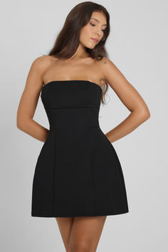 Cut from premium, high density knit fabric, our new Eres Dress is the epitome of a little black mini dress. With its' strapless design and fitted bodice, the extra seam details give this classic style a twist with a slight shaping effect at the hips giving it the LEAU fit we are most notably known for. Mini A Line Dress, Bustier Mini Dress, Strapless Bustier, Mini A, Fall 24, Bustier Dress, Black Mini Dress, Line Dress, Corset Dress