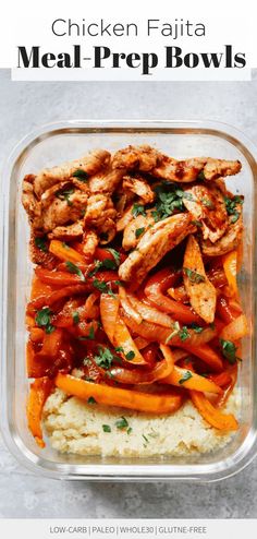 chicken fajita meal prep bowls in a plastic container with rice and carrots