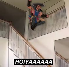 a skateboarder is doing a trick in the air on a stair case with words above it