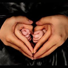 two hands making a heart shape with the words, ya alla please have mercy on my parents