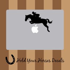 an apple computer with a horse and jockey on the screen that says, hold your horses'decals