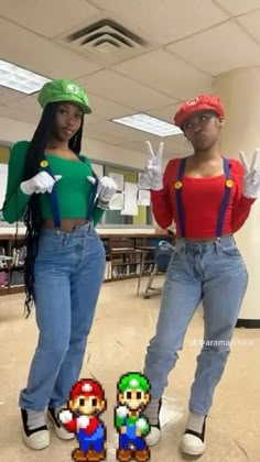 two people dressed up as mario and luigi