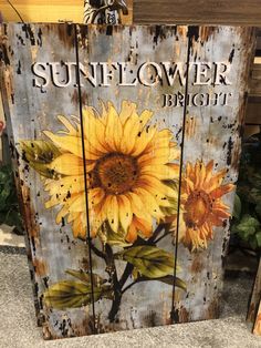 a wooden sign with sunflowers painted on it's sides and the words, sunflower bright