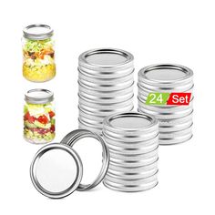 a set of four metal canisters with lids