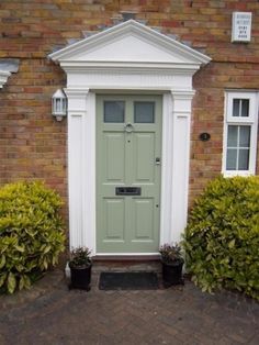 there is a green front door on this house