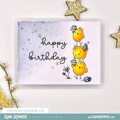 a happy birthday card with two chicks on top of each other and stars in the background